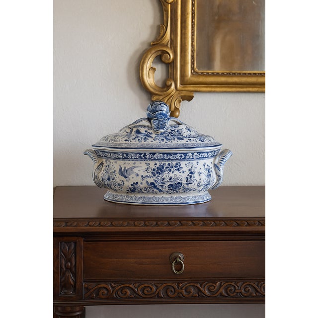 A superb antique Dutch Delft faience lidded soup tureen. Maker's mark on reverse featuring an axe or hatchet, denoting...