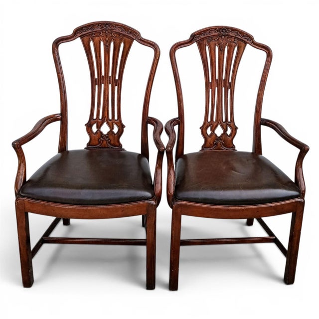 Elevate your space with this exceptional pair of Jonathan Charles mahogany Leather Armchairs. Timeless Design Meets...