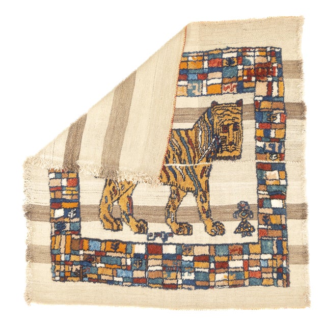 This antique Gabbeh Palas rug, woven circa 1920, is a rare piece of Persian tribal art. It features a flat-woven wool base...