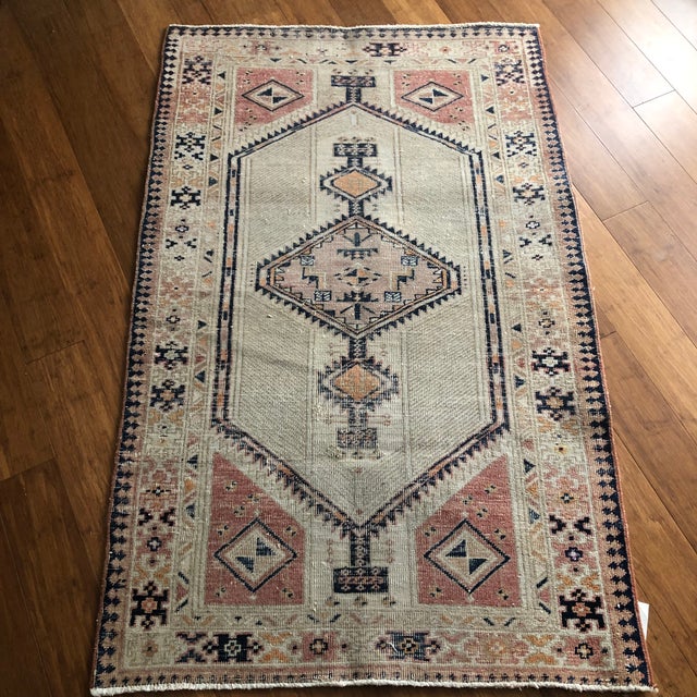 A Distinctive Small Antique Serapi Rug This beautiful antique Serapi rug was handwoven in the early 1900s and reflects the...