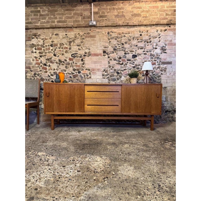 Rare swedish mid-century teak sideboard by nils jonsson. model: arild produced by: hugo troeds year of design: 1964 the...