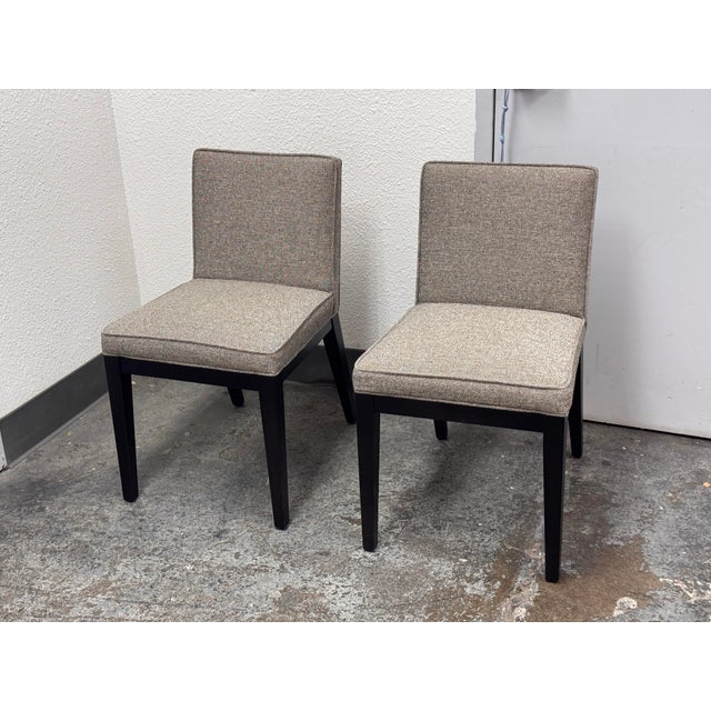 Design Plus Gallery presents a Pair of Ansel Side Chairs by McCreary Modern for Room & Board. The armless chair has a...
