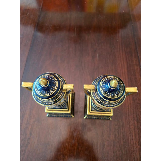 A very fine and exquisite museum quality pair of antique signed and marked royal vienna urns ( guaranteed over 125 years...