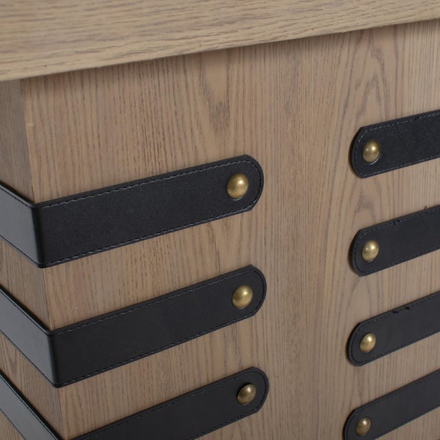 Crafted in collaboration with designer Robin Baron, this leather-wrapped console table is a striking blend of luxury and...