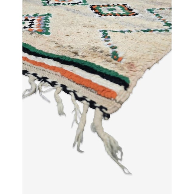 Vintage Boujad Rug | Handwoven Berber Wool Rug with Cream Field and Diamond Medallions This charming vintage Boujad rug...