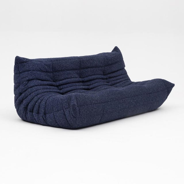 This Togo has been reupholstered with new foam and high-quality new fabric, keeping its inner structure, giving the item...
