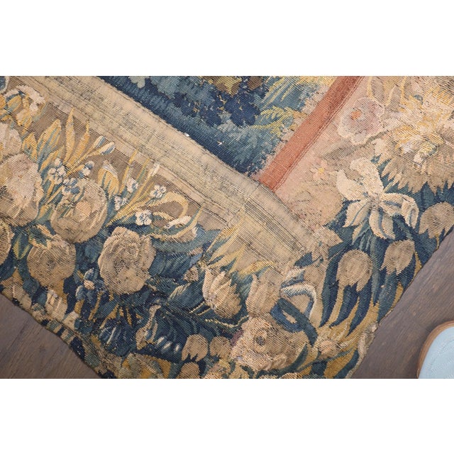 This grand textile masterfully creates a dramatic sense of depth, utilizing majestic, densely foliated trees in the...
