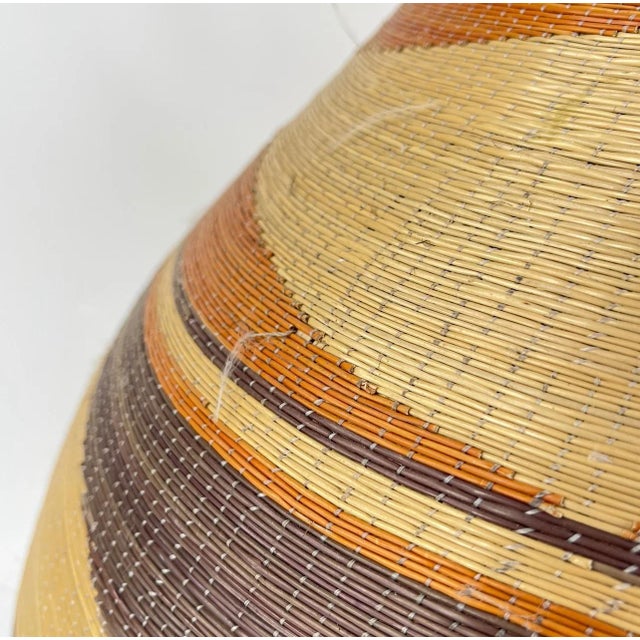 These baskets represent an exquisite form of artistry among the Tutsi and other ethnic groups like the Hutu and Twa,...