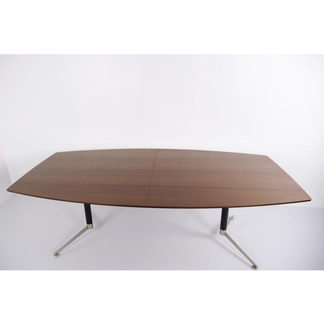 Large conference table from the paustian spinal collection designed by paul leroy. Crafted in smoked oak with a...