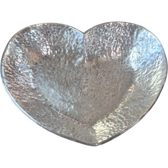 Hand hammered silver plate heart bowl by Emilia Castillo messures 6.5 inches wide and is perfect for olives.