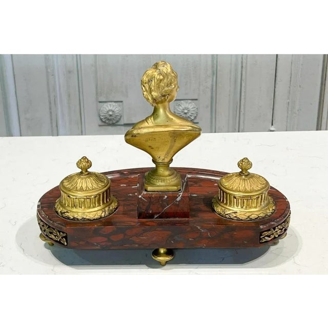 Antique French Gilt Bronze Inkwell on Rouge Marble Stand. It is of superb quality and features a central figure of Diana...