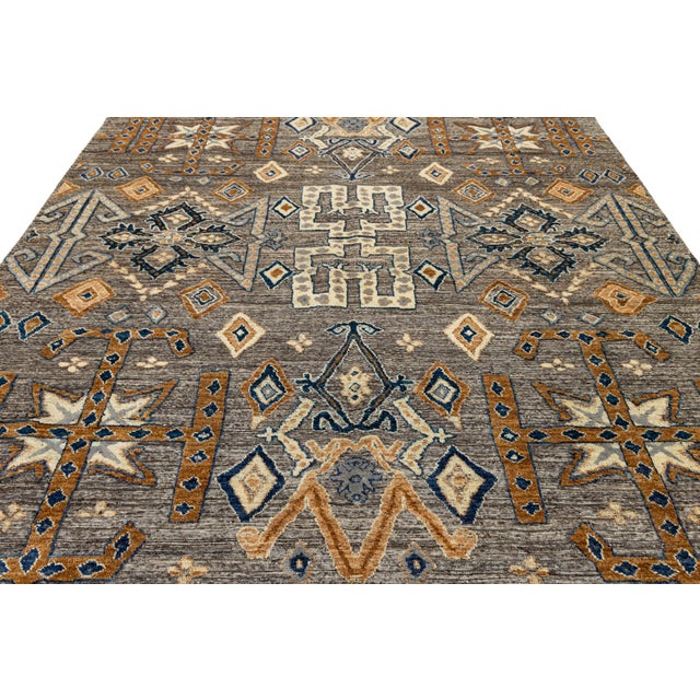 This piece communicates a global language through its bold geometry inspired by West African Mudcloth and Kuba textiles,...