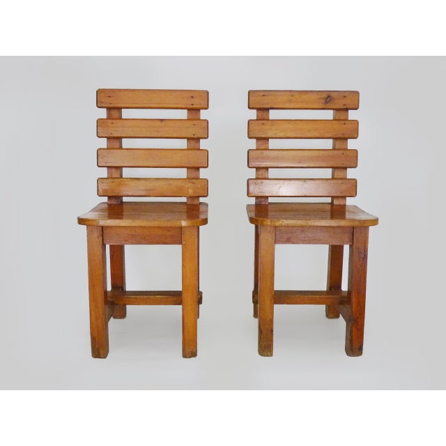 Pair of Vintage Solid Oak Chairs from the 1970s Beautiful set of two solid oak chairs, quite heavy. Chairs made in the...