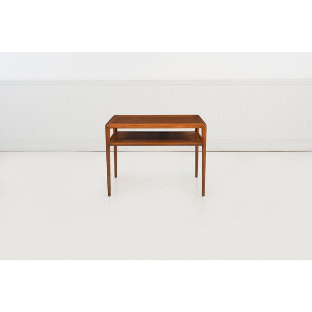 T.H. Robsjohn-Gibbings for Widdicomb Model 1781 Two-Tier Lamp Table, 1953 A two-tier table designed by T. H. Robsjohn-...