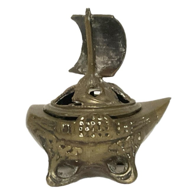 This incense burner (koro), crafted in the shape of a traditional sailing vessel, possibly dates from the early 20th...