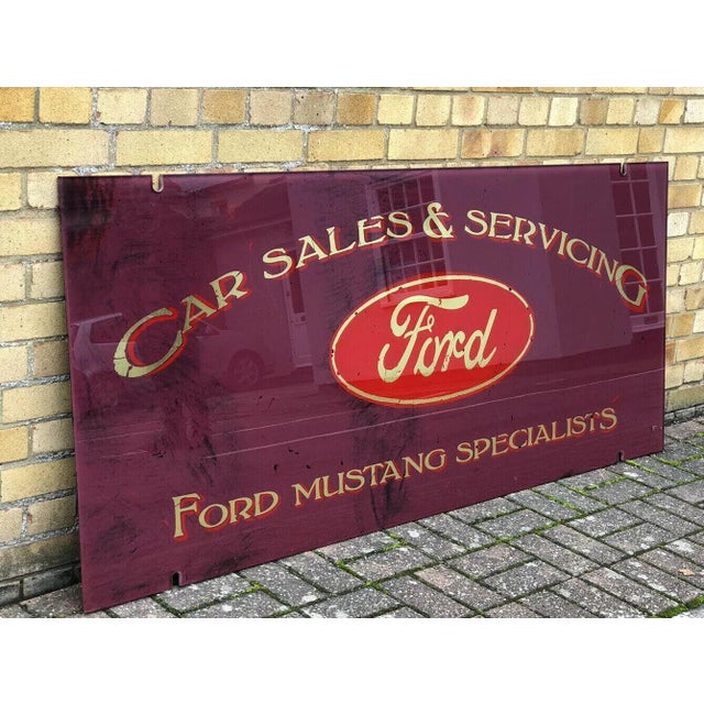 Ford sales & repairs glass shop sign. Mustang specialists. Great man cave piece. Looks great mounted with a light behind....