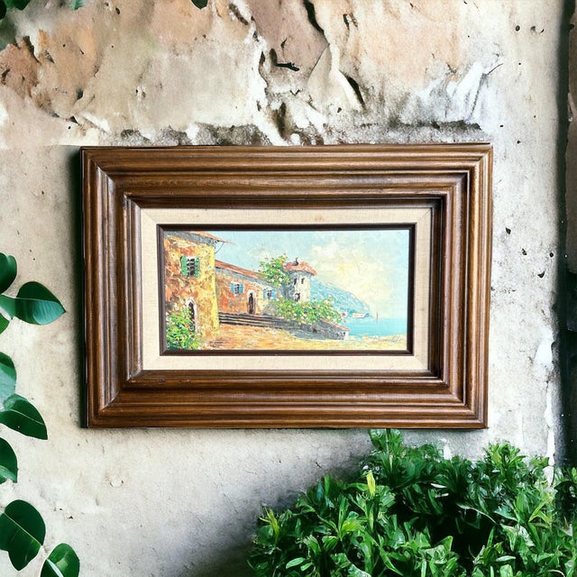 Mid-century original oil painting on board. A 6”x12” seaside landscape signed Reynolds. This painting will brighten your...