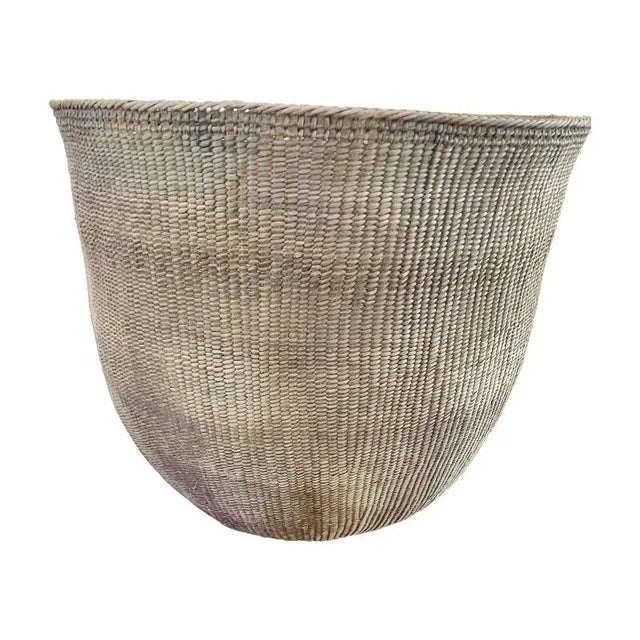 A large tight-woven basket with a beautiful patina. From the indigenous Havasupai people of the Grand Canyon region of the...