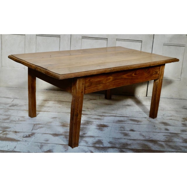 Antique French chestnut occasional/coffee table. Made from Chestnut, with a planked finish to the top. C1900 This table...