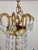 This elegant empire-style chandelier by Visual Comfort exudes timeless sophistication with its cascading strands of...