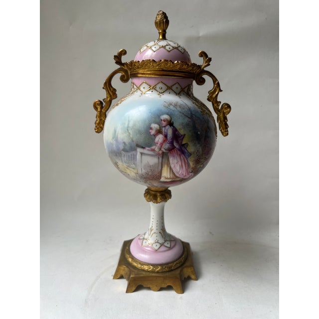 Antique French Sevres painted porcelain and champleve enamel lidded vase with encrusted gold gilt Sizes. high 10”, width...