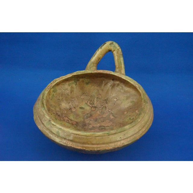 Item : Fabulous, unique single-handled majolica terracotta bowl, entirely handcrafted on a lathe, including the fluting...