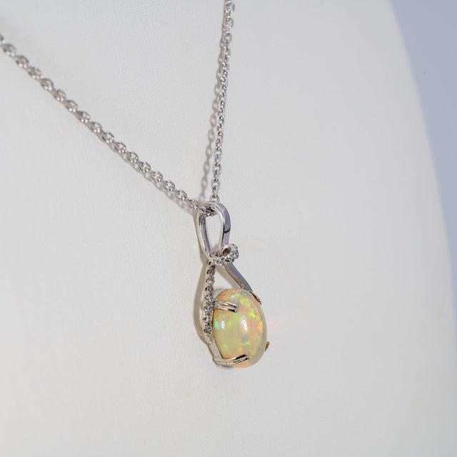 2020s 1.8Ct Ethiopian Opal Pendant With Natural Diamonds: Solid 14k Gold, Oval 10x8mm For Sale - Image 5 of 7