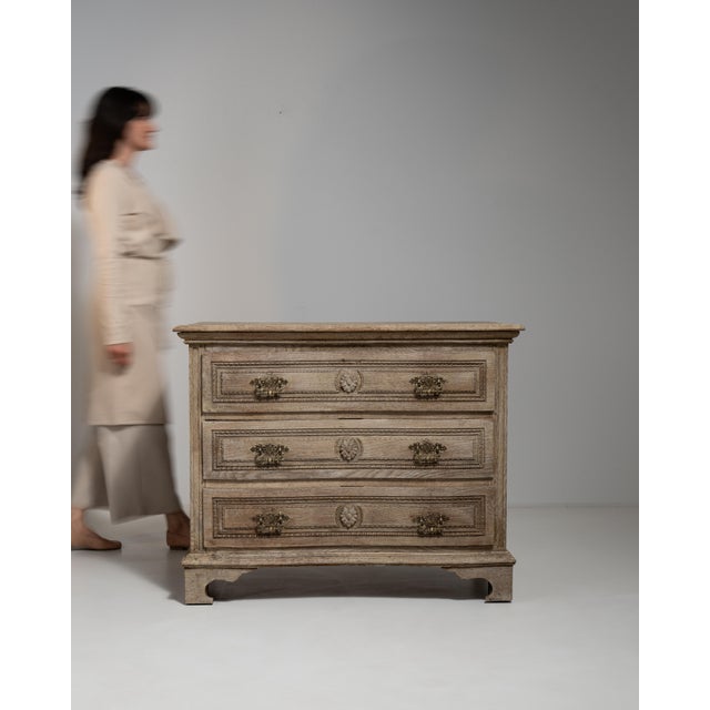 A superb example of Louis XV taste rendered in warm, honey-toned oak, this 19th-century French chest of drawers captures...