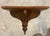 Vintage wooden wall shelf perfect for displaying a favorite vase, small painting or antique plate. MAKER'S MARK: None...