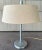 1930s Art Deco Industrial Age Walter Von Nessen table lamp with metal reflector and original linen shade. In very good...