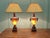 A Pair of Glass Table Lamps The lamps have a central baluster glass bowl which lights when the lamps are on, they have...