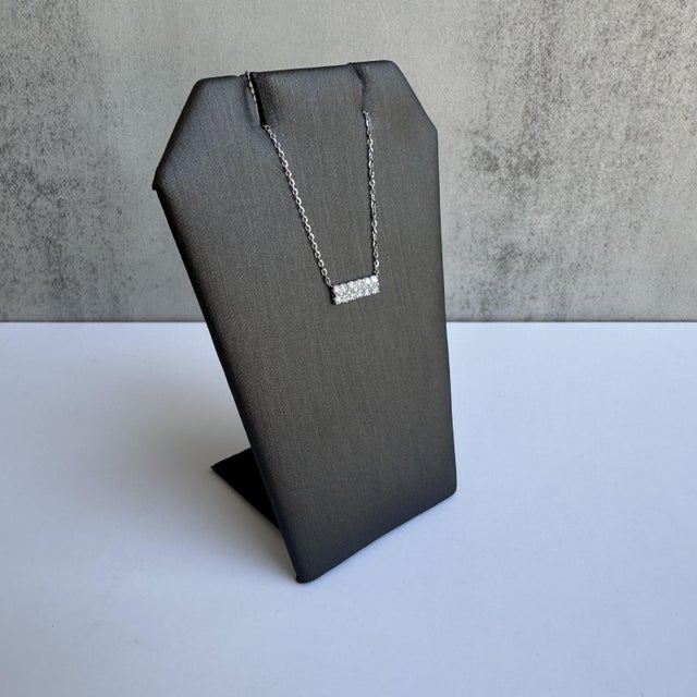 Enhance your jewelry collection with this exquisite Diamond Bar Necklace in 14kt White Gold. Featuring 0.21 carats of GH...