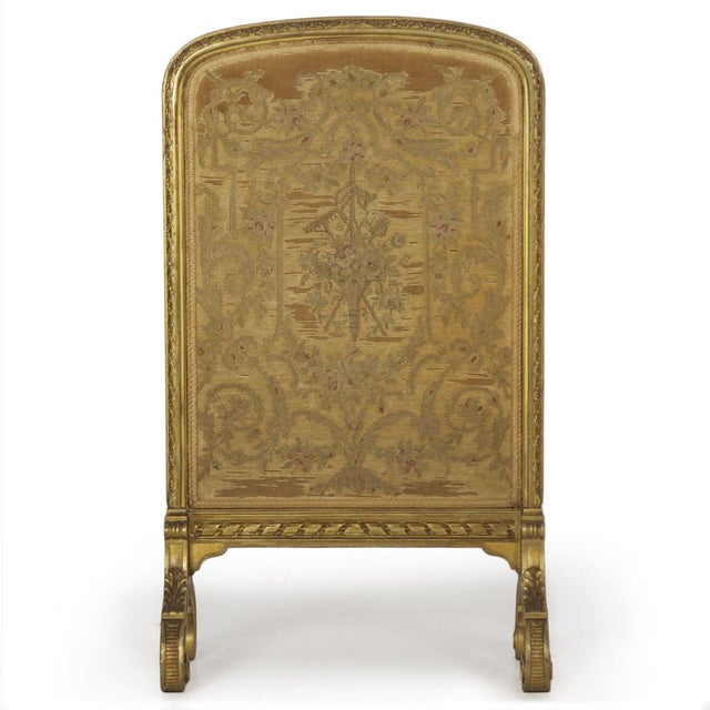 FRENCH LOUIS XVI STYLE GILTWOOD FIRESCREEN With original needlepoint tapestry; circa 1900 Item # 809VPY25 A lovely French...