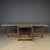 Antique early-20th Century American pine gatelegged table, has its original decoration, hand painted at the turn of the...