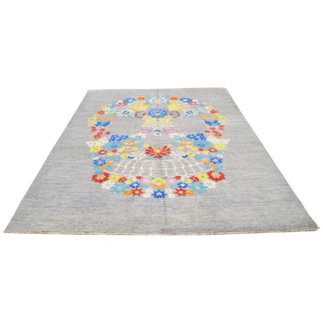 Hand-knotted with care using traditional rug-making techniques, this wool rug blends timeless craftsmanship with a modern...