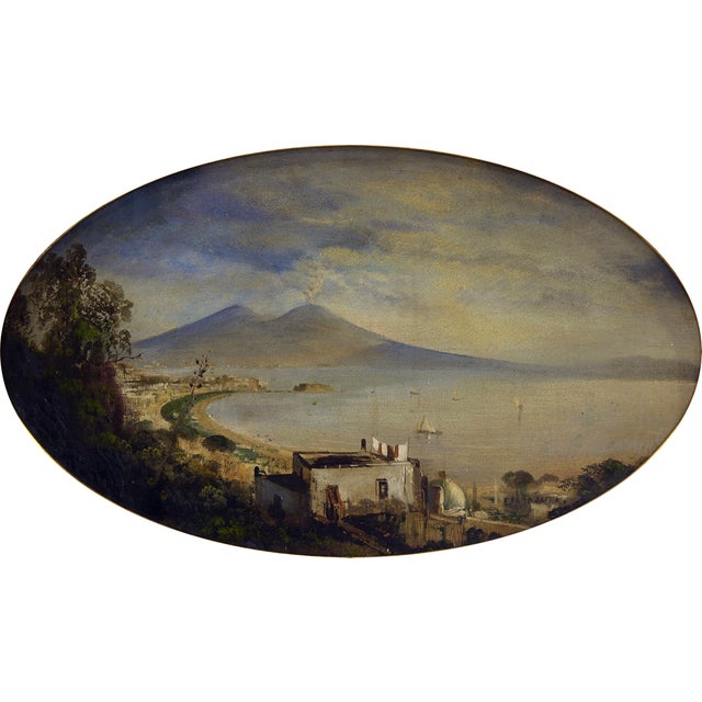 This captivating 19th-century Italian landscape painting by Ettore Ferrante captures a serene view of the Gulf of Naples...