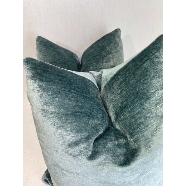 Custom pair of 22” pillows covered in a super soft linen blend velvet in a dark aqua. These pillows have tapered corners...