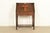 A rare and exceptional antique Mission or Arts & Crafts period quarter sawn oak cut-out drop front secretary desk In the...