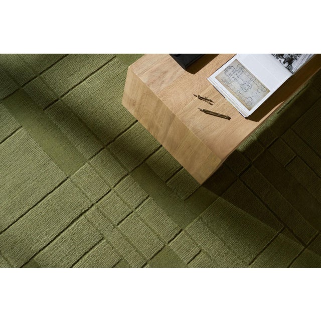 Step into a world of iconic design with our Frank Lloyd Wright collection hand made rug. Perfect for any space in your...