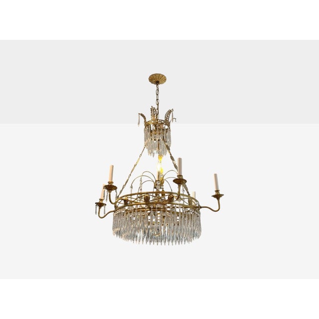 Russian Neoclassical, Bronze, Crystal Chandelier, Italy, 1950s A bronze and crystal chandelier designed and produced in...