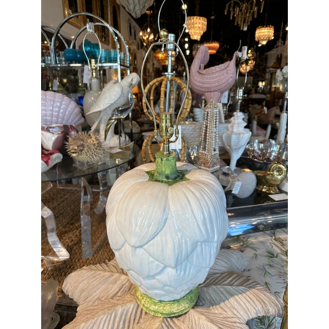 Vintage ceramic artichoke table lamp. No chips or breaks. This has been newly wired, clear cord. All new brass hardware...