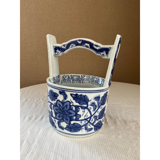 Vintage blue and white painted waterfall-style cachepot