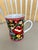 Beautiful and vibrant Vera Bradley ceramic mug in the highly sought-after "Poppy Fields" pattern. This stunning piece...