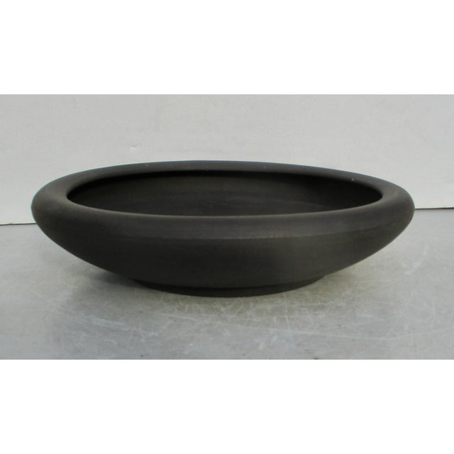 Black Wedgewood low bowl, centerpiece. Clean simple design covered in a soft black sheen of the matte basalt glaze. Marked...