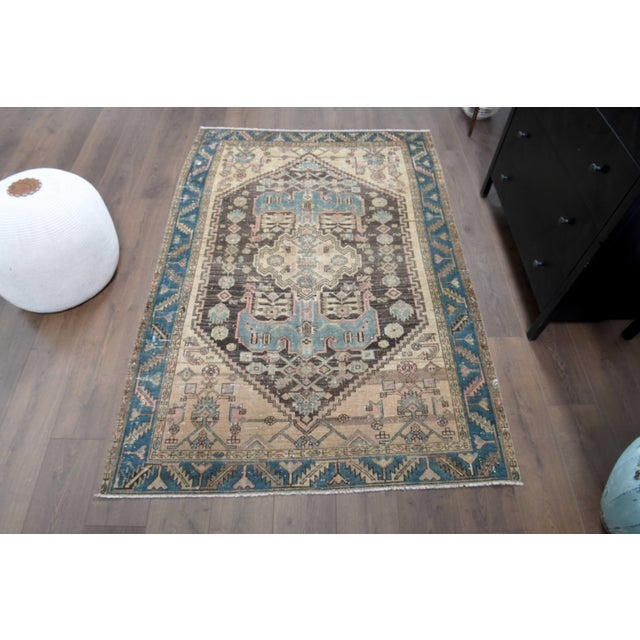 Vintage Persian Hand-Knotted area rug is a semi-antique vintage area rug. The '70s Eastern region of Anatolian's unique...