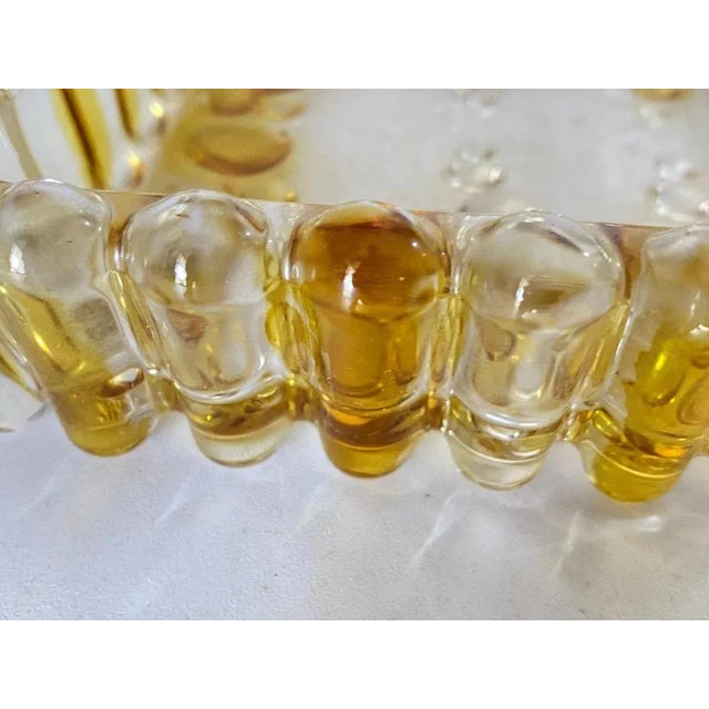 French Art Deco glass decorative dish with glass colored bubbles in very good overall condition. It has been made in...