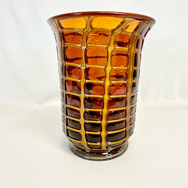 This is a stunning piece of vintage Handblown glass. The vase is fairly large and features a gorgeous rich Amber glass...