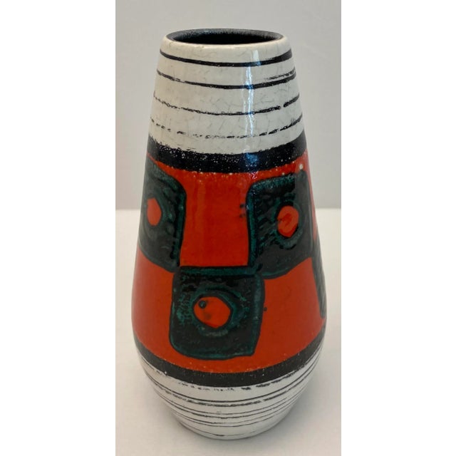 A fine quality mid-century ceramic vase from West Germany, circa 1970s. Hand-crafted using centuries old techniques. This...