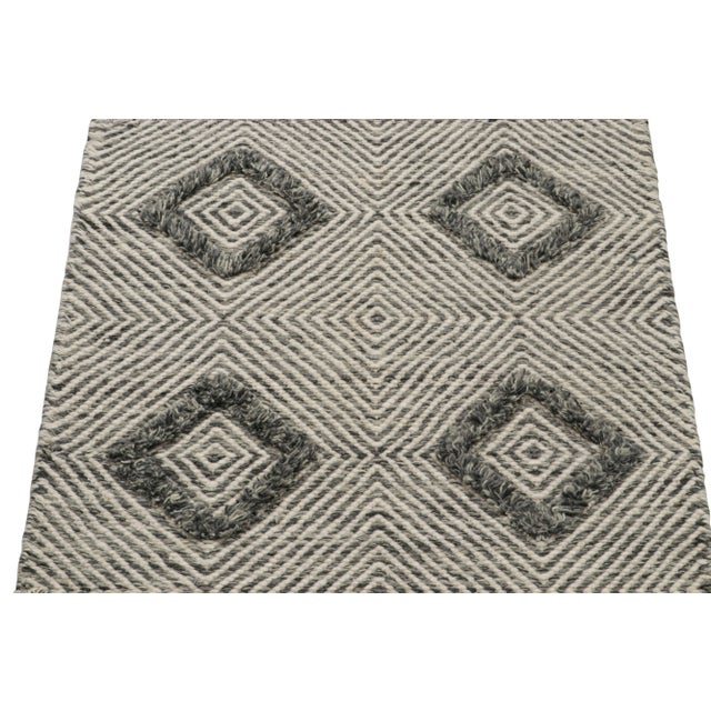 Handwoven in wool, a 2x2 scatter rug from Rug & Kilim’s modern selections. On the Design: The piece plays flatweave and...