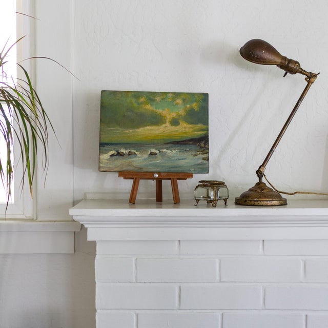 This small, vibrant seascape painting features a brilliant sunset in bright colors of chartreuse, yellow, aqua, and green,...